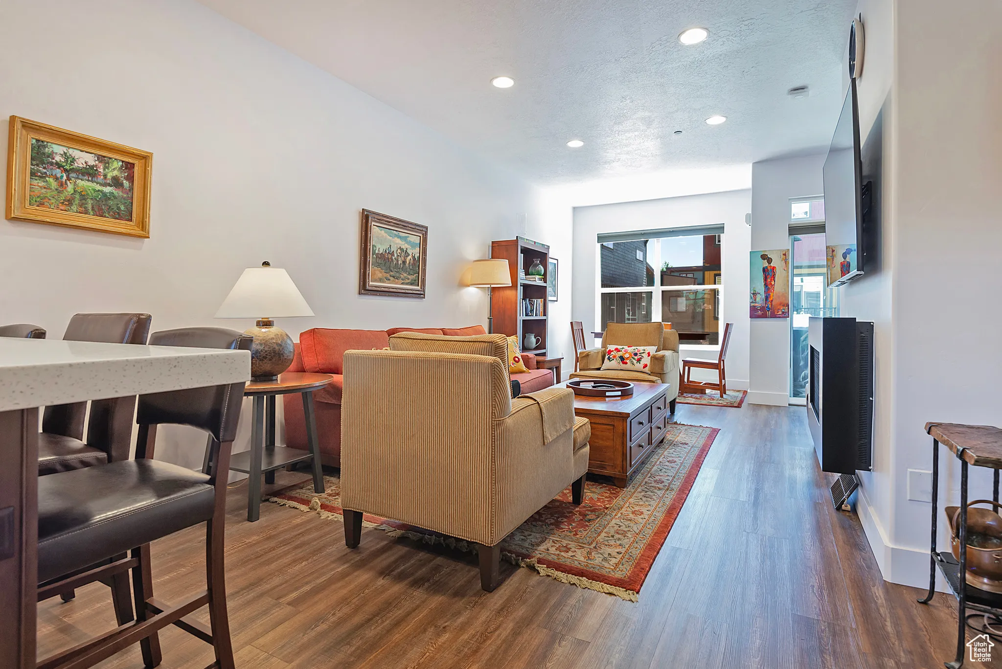 Great Room from Kitchen to Small Deck with Gas Grill