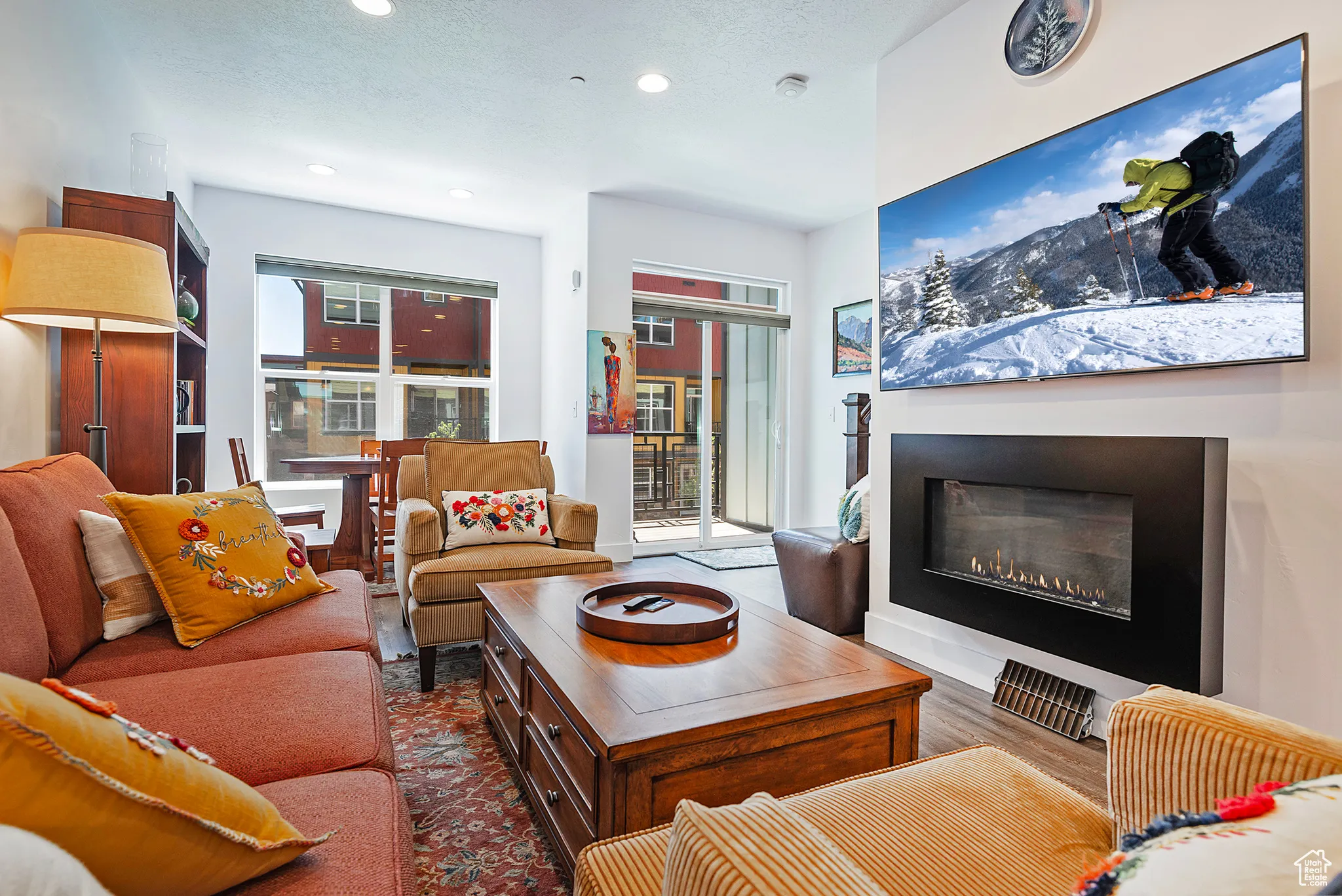 Great Room with Fireplace and looking out to small deck for Grilling