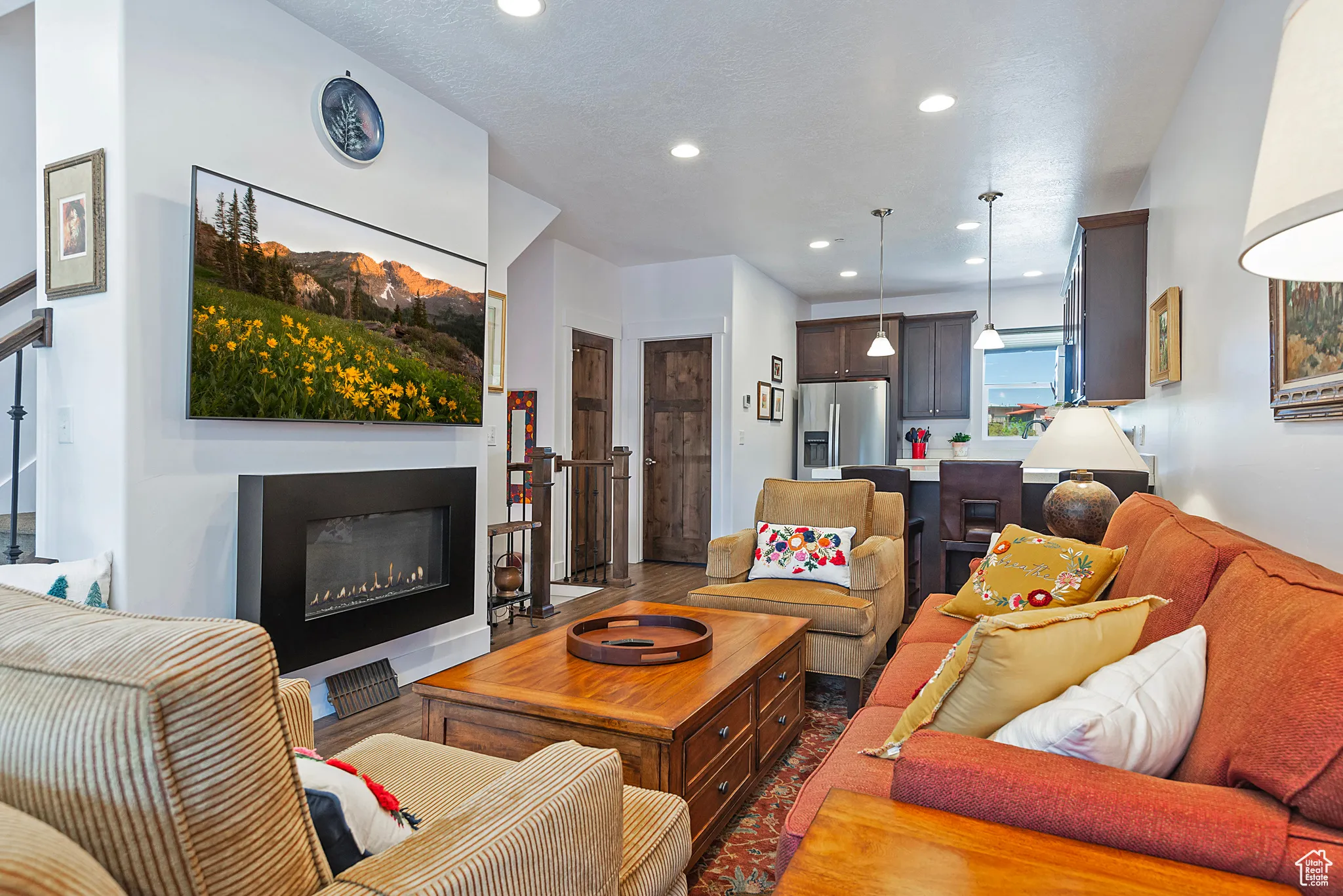 Great Room with Fireplace & Kitchen Beyond
