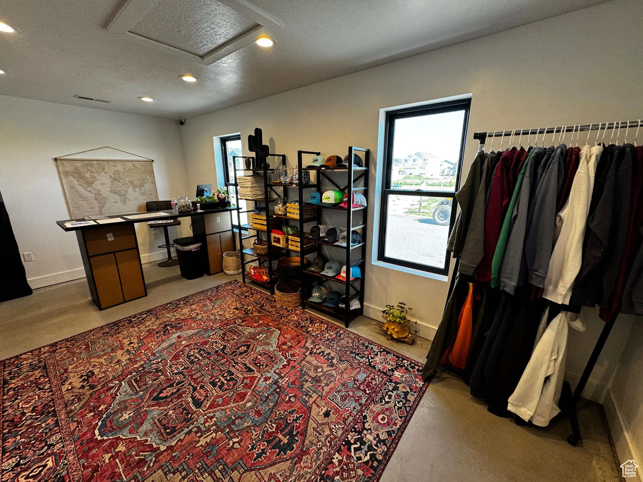 Office with attic access, recessed lighting, carpet, baseboards, and a textured ceiling