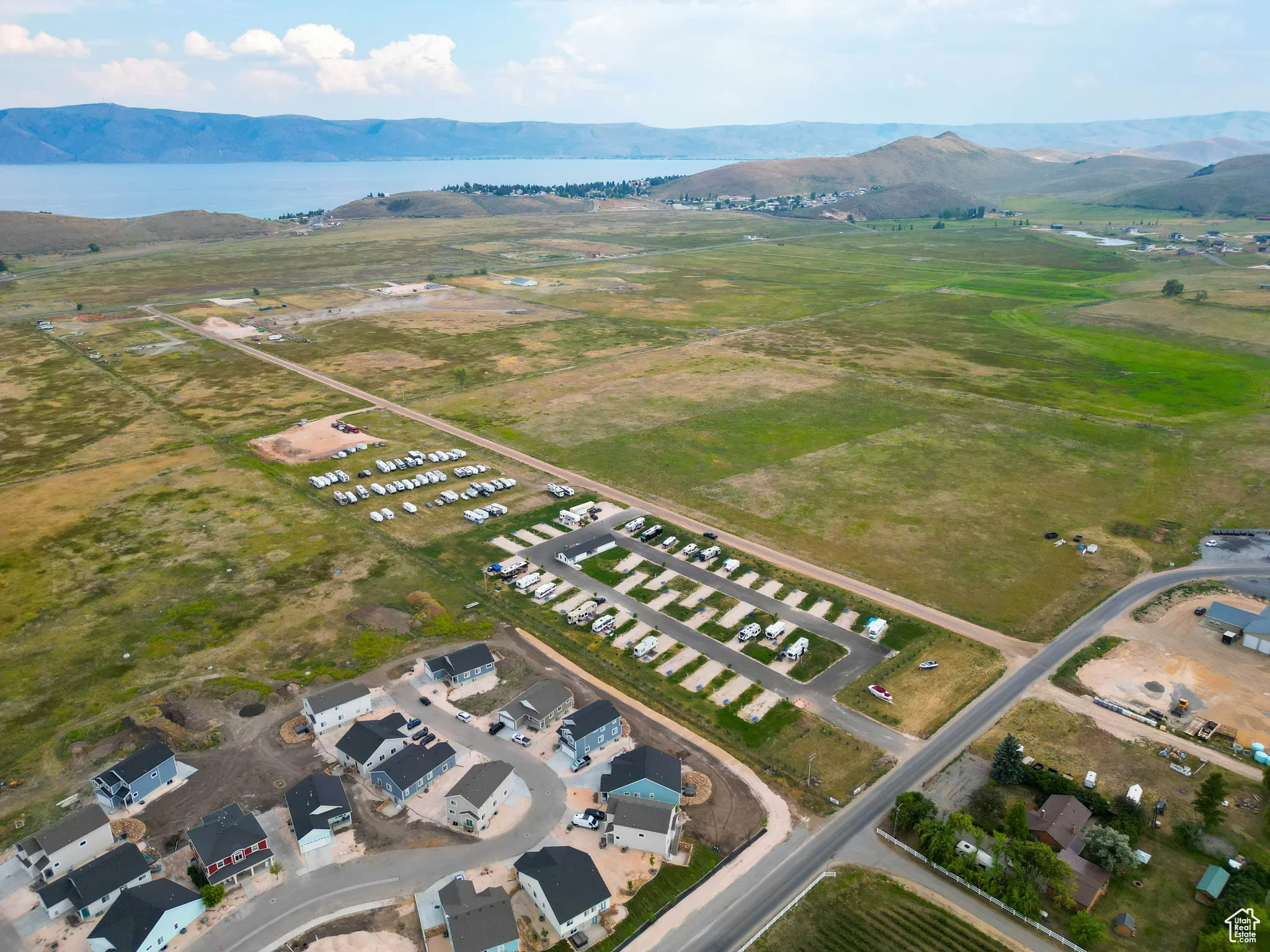 View of property location featuring a water and mountain view