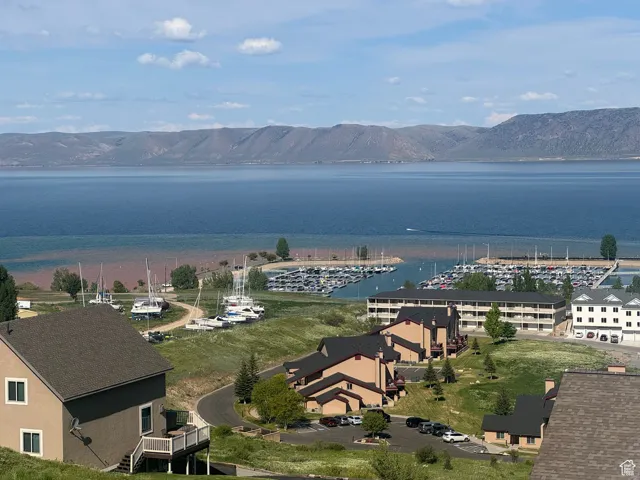 Aerial view of a water and mountain view and a marina