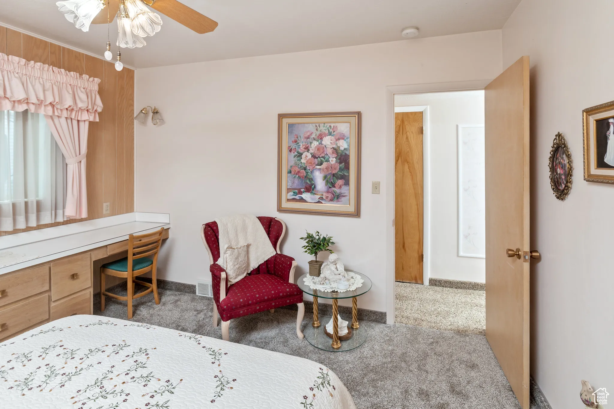 Bedroom with carpet floors and baseboards