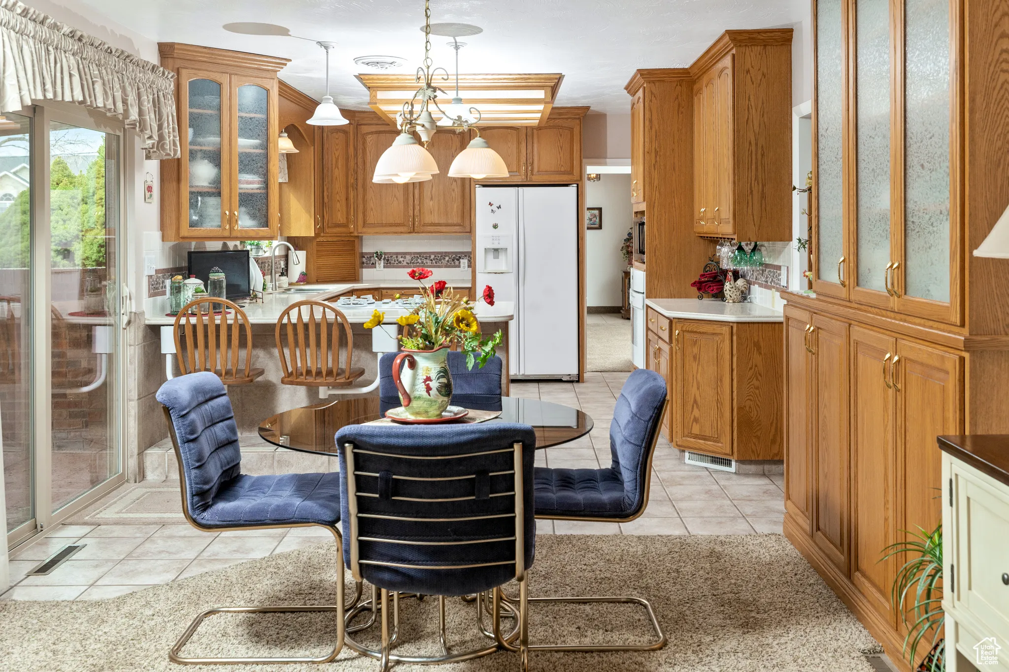 Dining room with light tile patterned floors