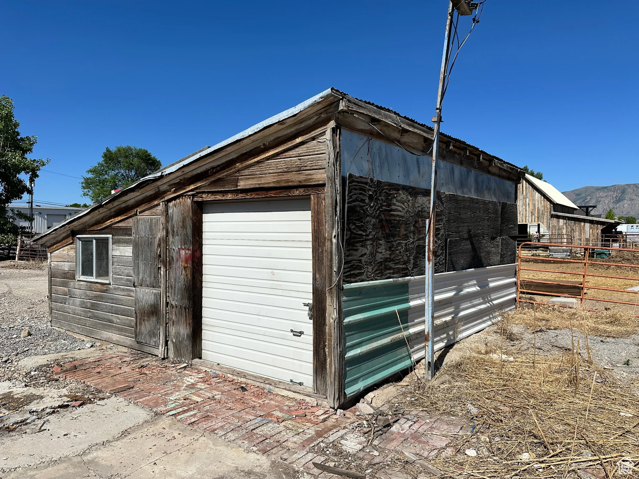 View of outbuilding with a mountain view