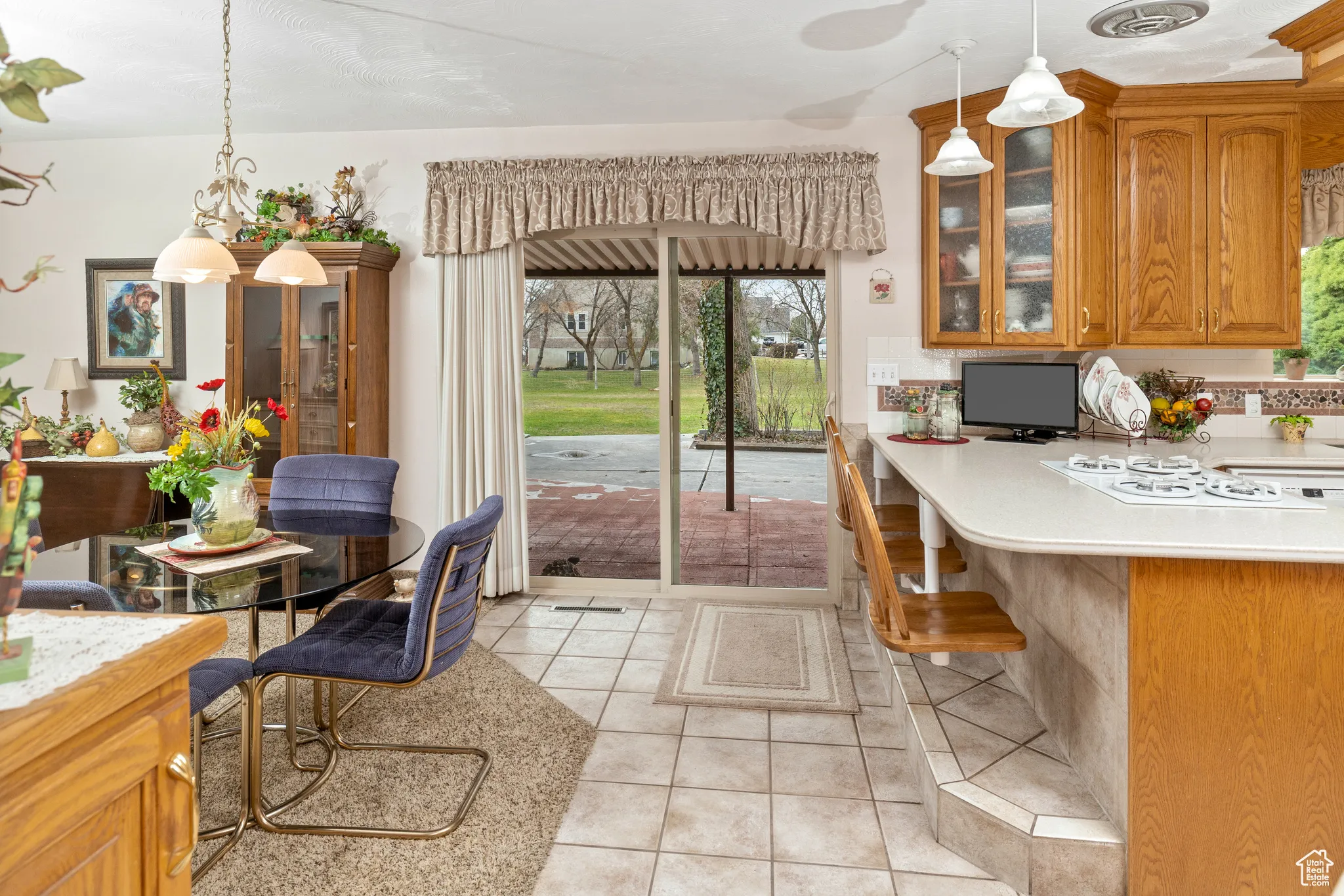 Dining area featuring light tile patterned floors