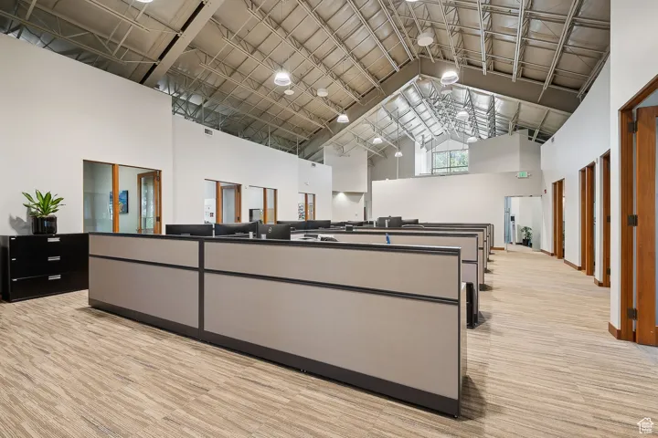 Reception area featuring high vaulted ceiling
