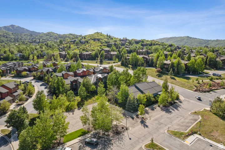 Aerial view of residential area featuring a mountain backdrop