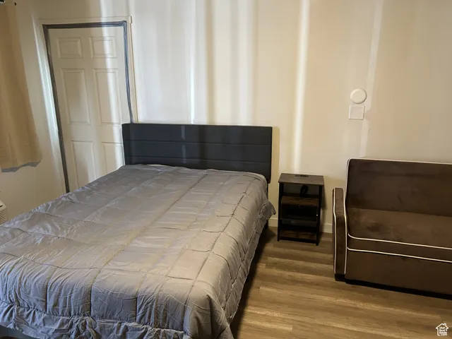 Bedroom featuring wood finished floors