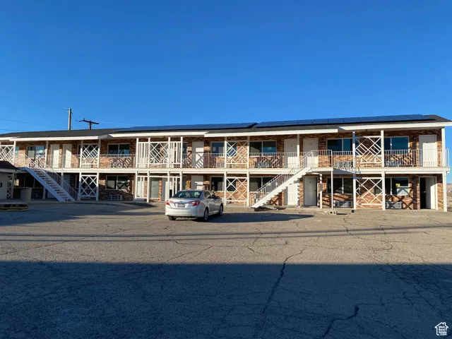 View of building exterior featuring stairs