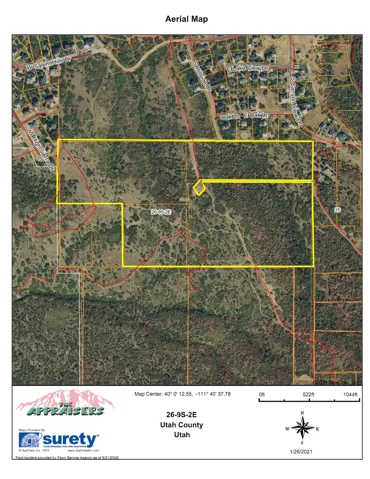 Aerial map of property and surrounding area featuring property boundaries highlighted