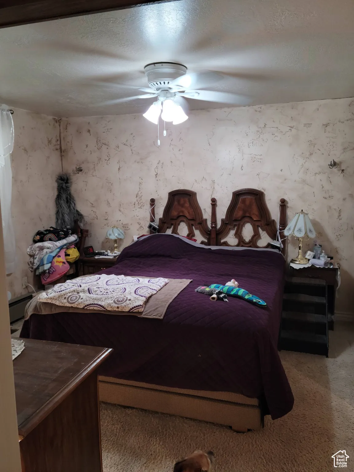 Primary bedroom with ceiling fan