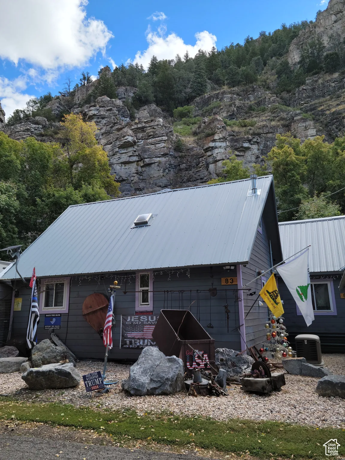 View of home featuring stand by generator