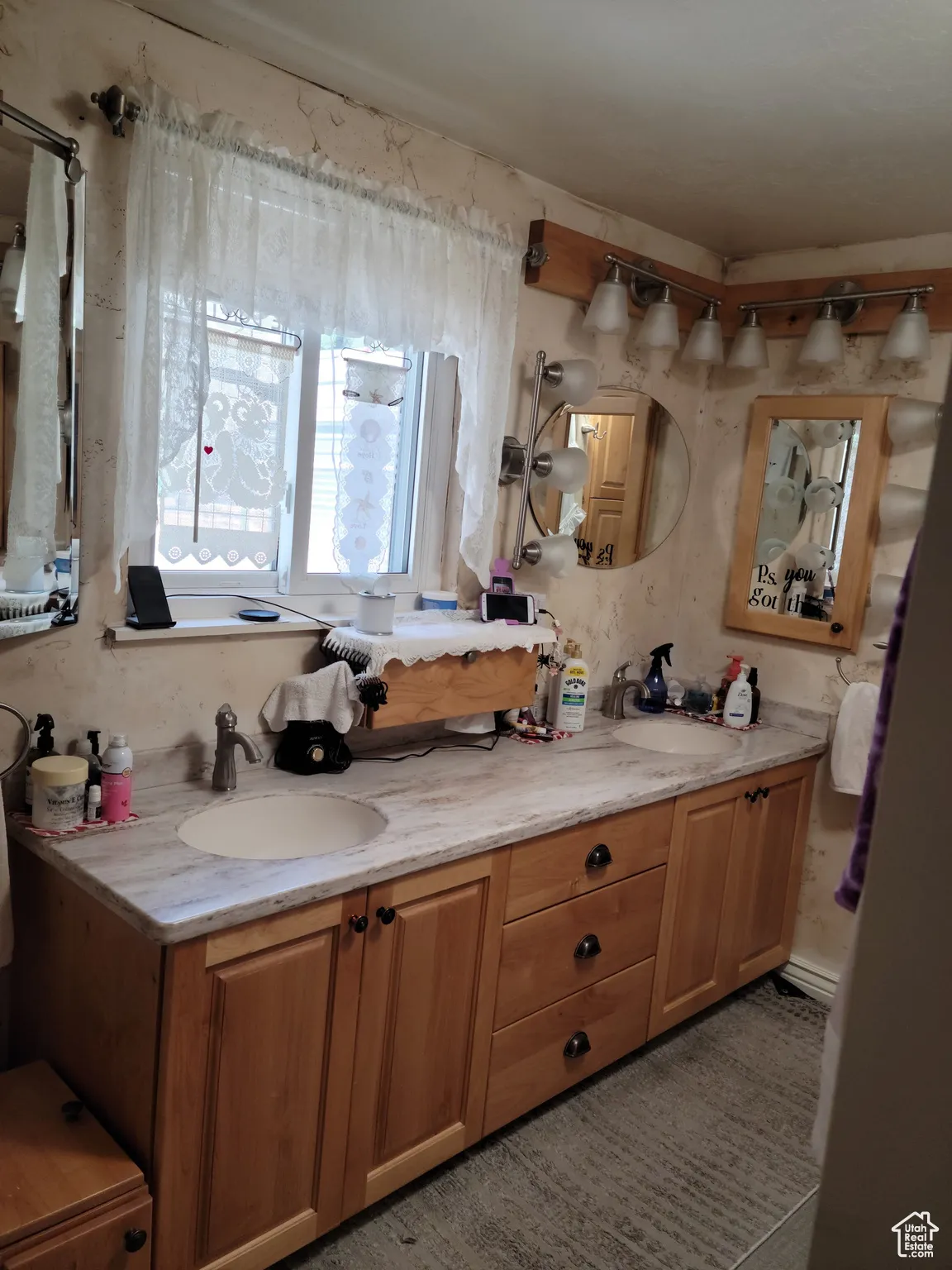 Bathroom featuring double vanity