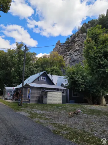 View of west side of home featuring metal roof