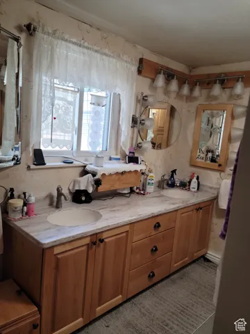 Bathroom featuring double vanity