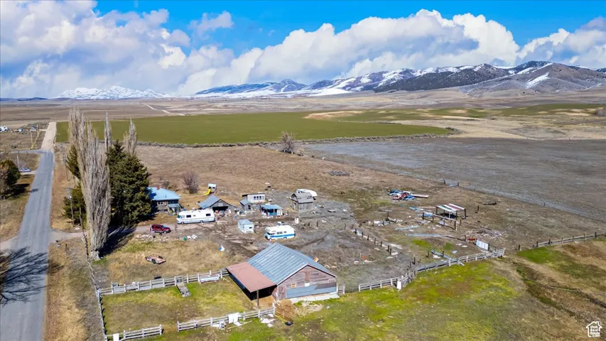 View of mountain background featuring rural landscape