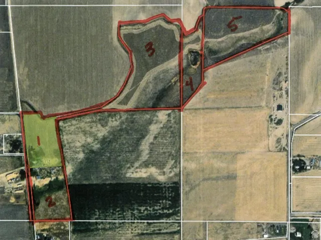 Aerial map of property and surrounding area featuring property parcel outlined