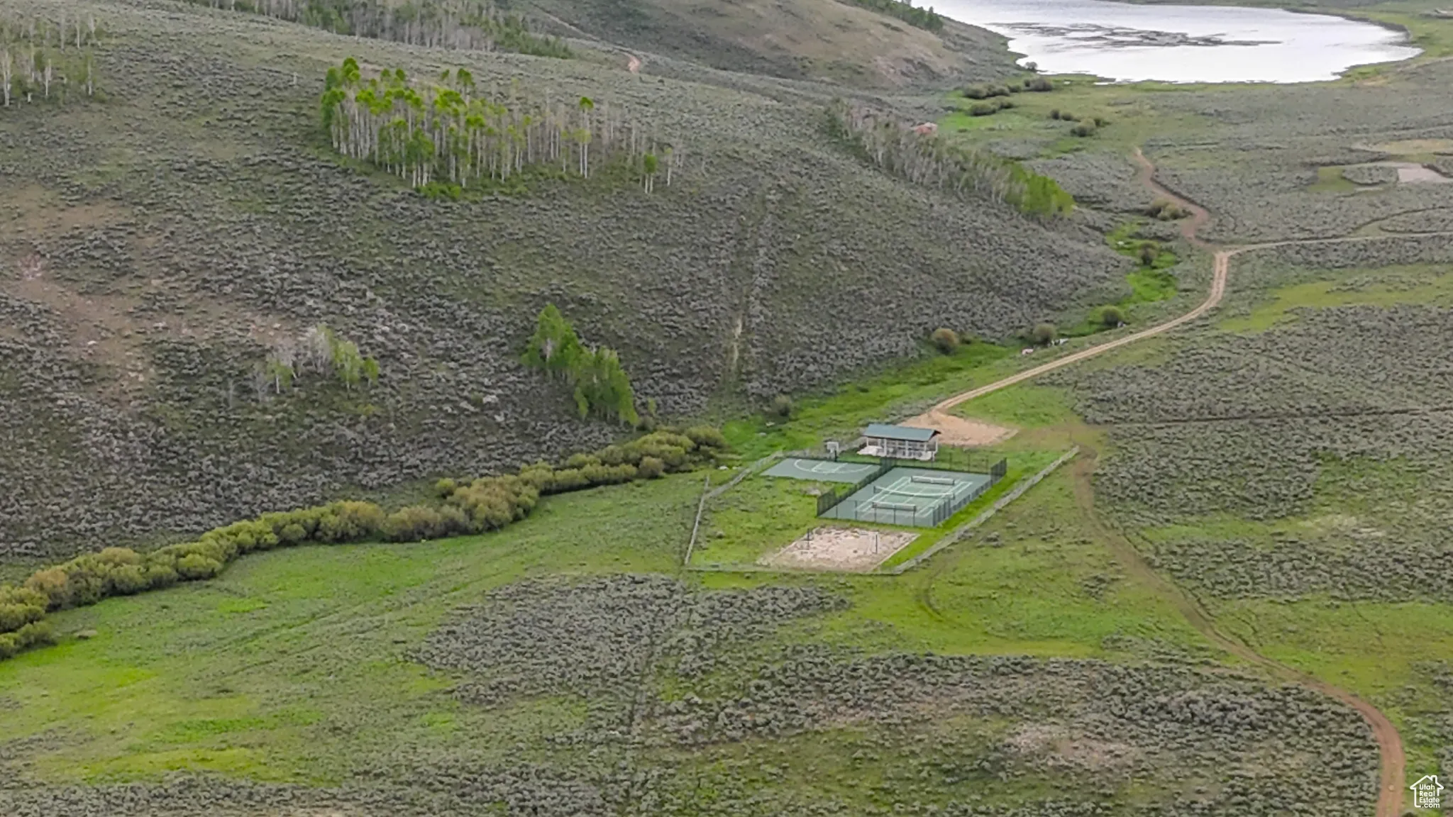 Aerial view of property and surrounding area with rural landscape