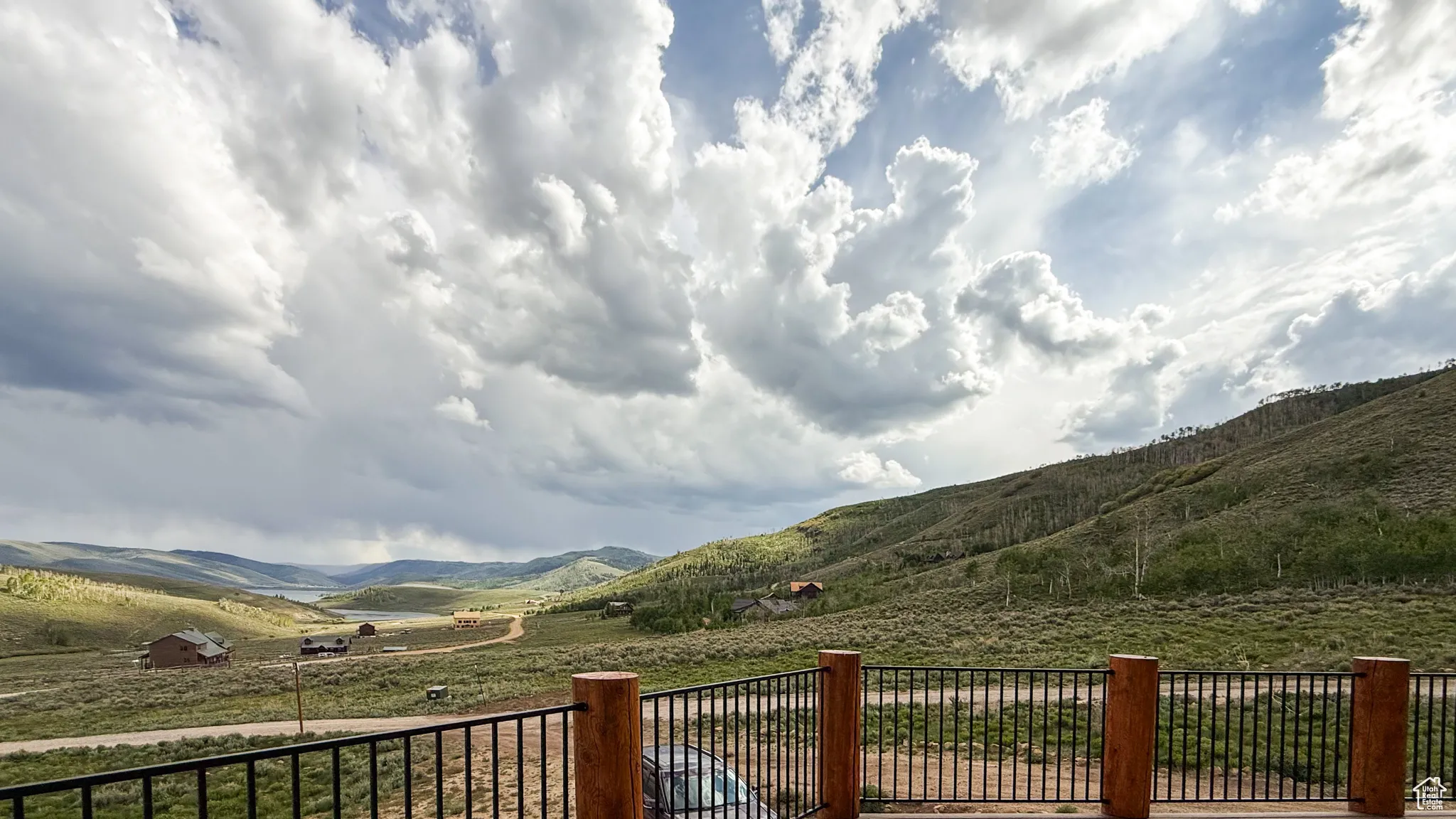 View of mountain background featuring rural landscape