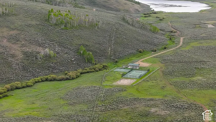 Aerial view of property and surrounding area with rural landscape