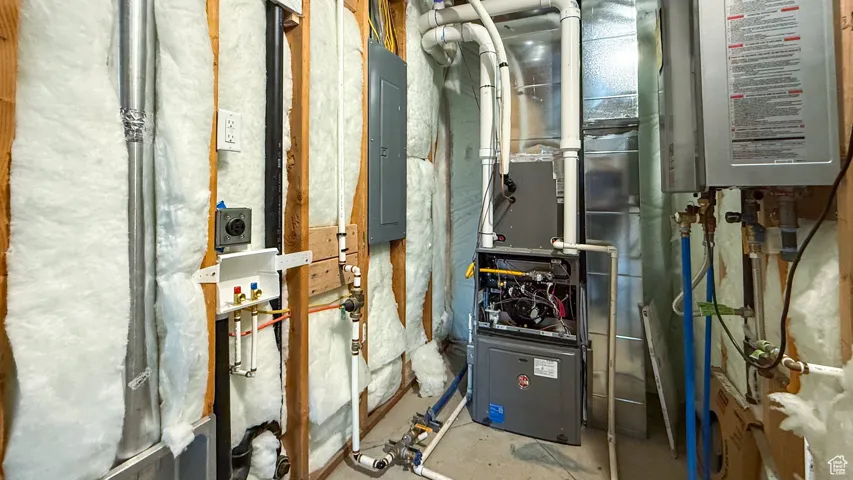 Utilities with heating unit, water heater, and electric panel