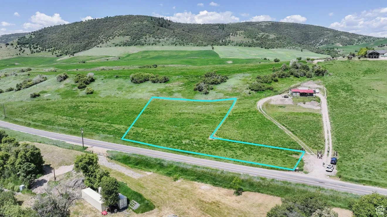 View of mountain backdrop featuring rural landscape- boundary line in picture is for visual/estimate only