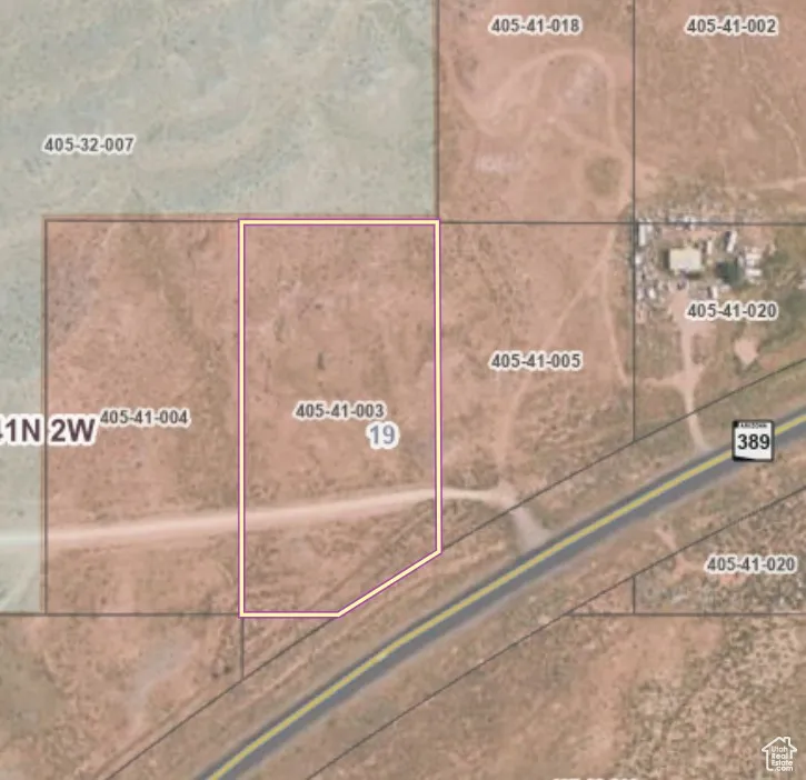 Aerial map of property and surrounding area featuring property boundaries highlighted