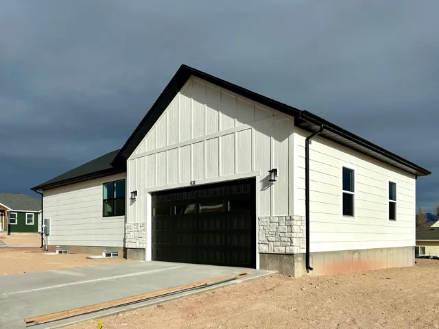 View of side of property featuring board and batten siding