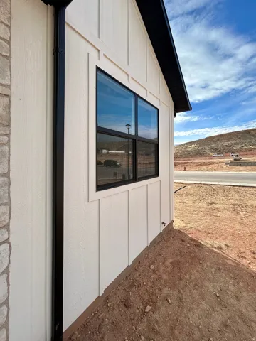 View of home's exterior featuring board and batten siding
