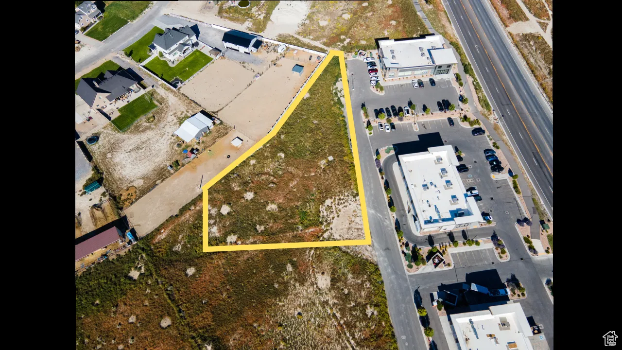 Aerial view of property's location with property parcel outlined