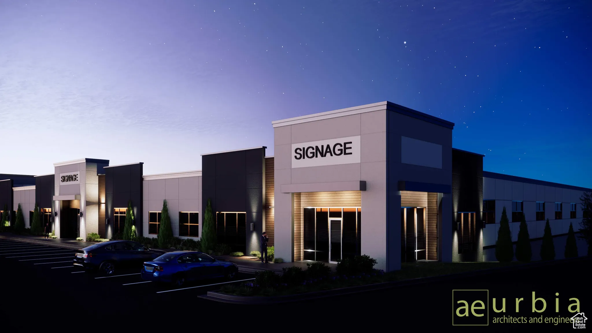 View of building exterior with uncovered parking