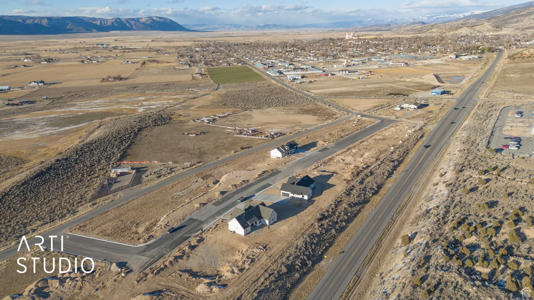 Aerial overview of property's location featuring mountains and rural landscape