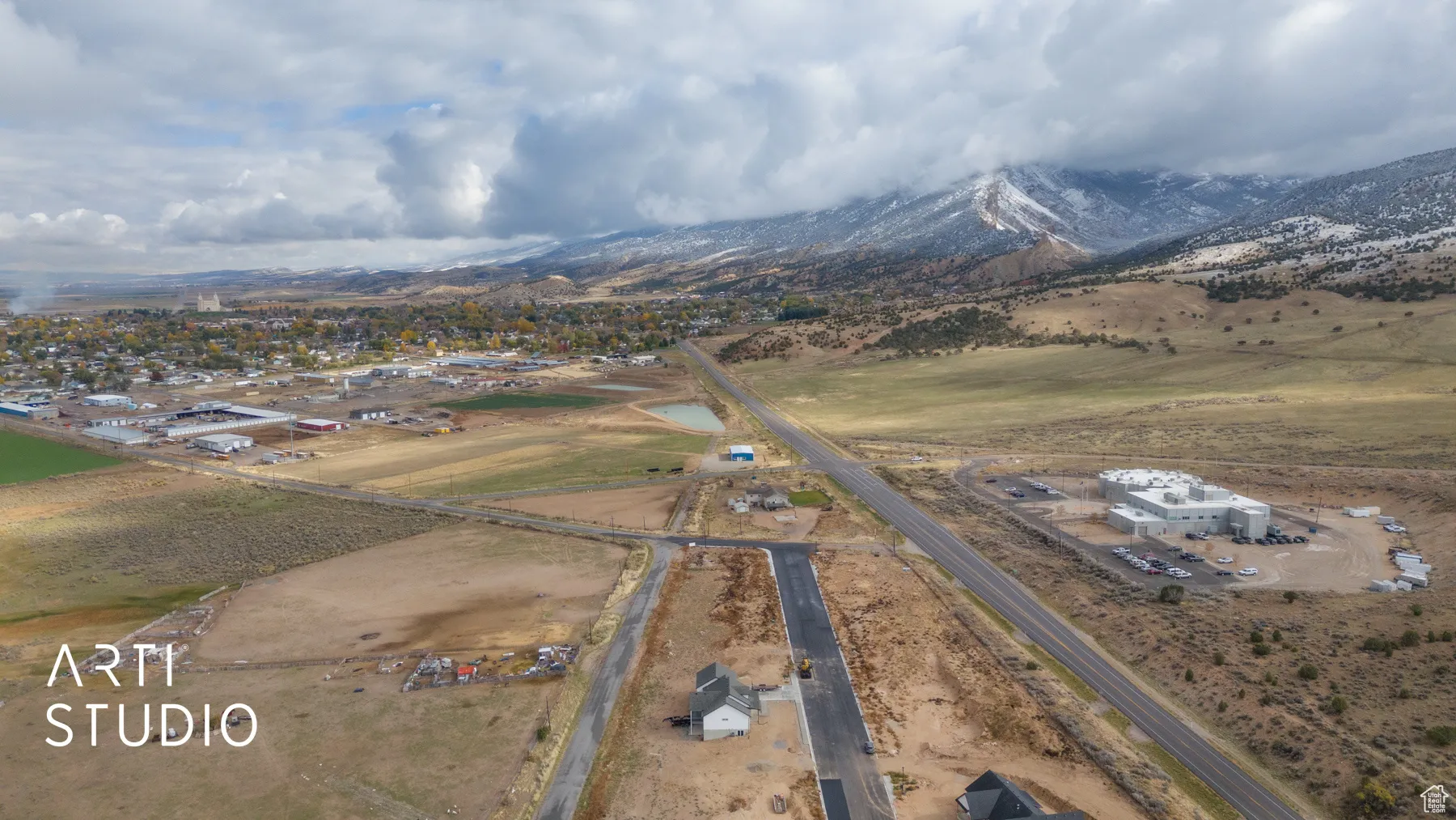 Aerial overview of property's location featuring mountains and rural landscape