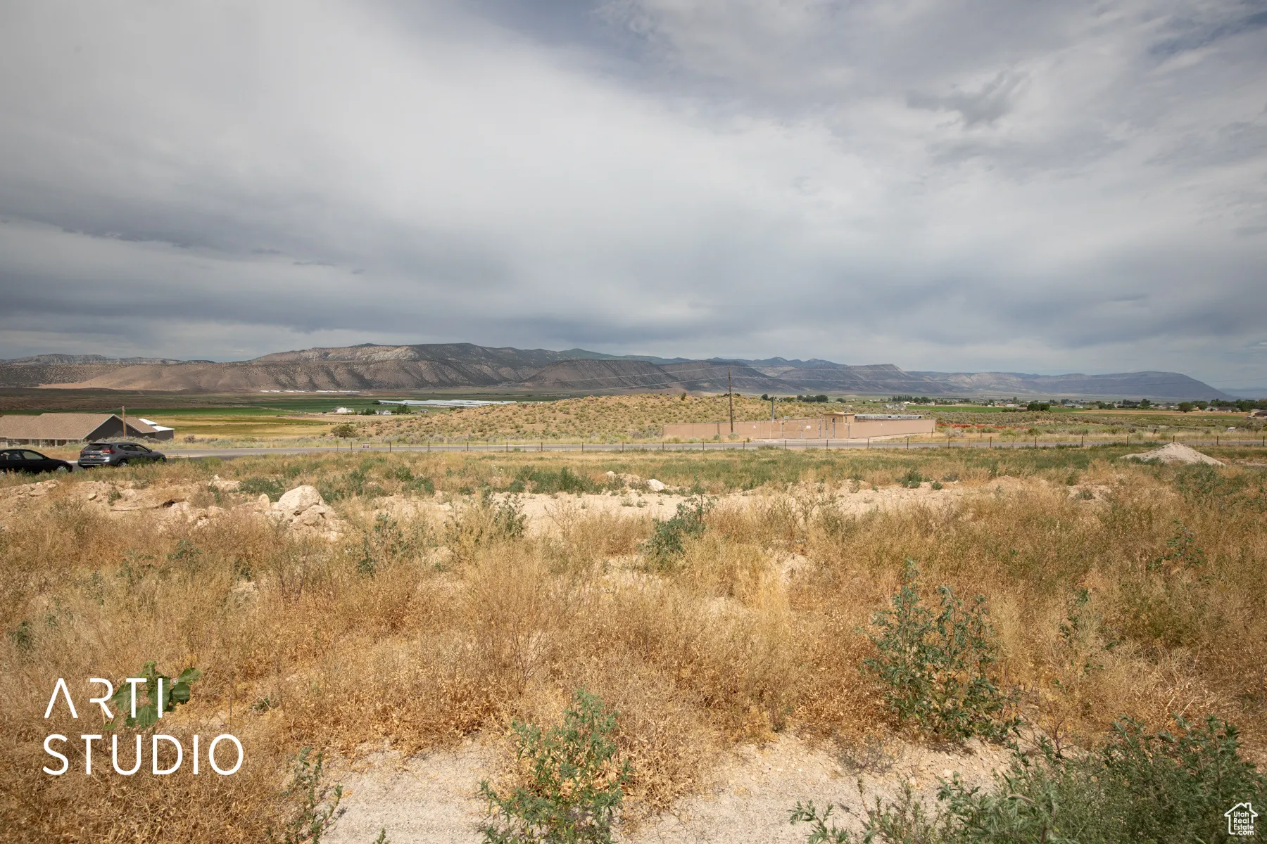 View of mountain backdrop featuring rural landscape