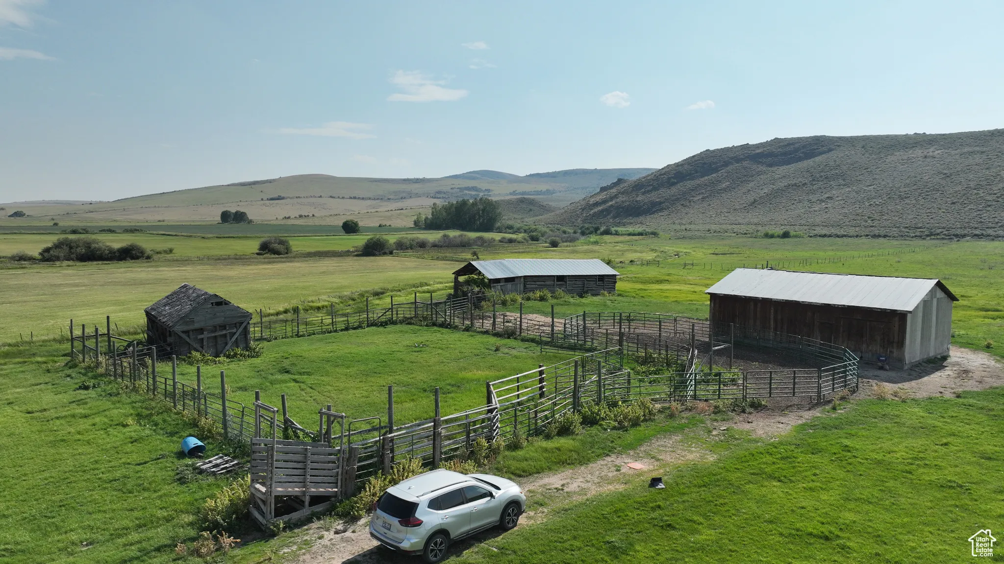 View of mountain background featuring rural landscape