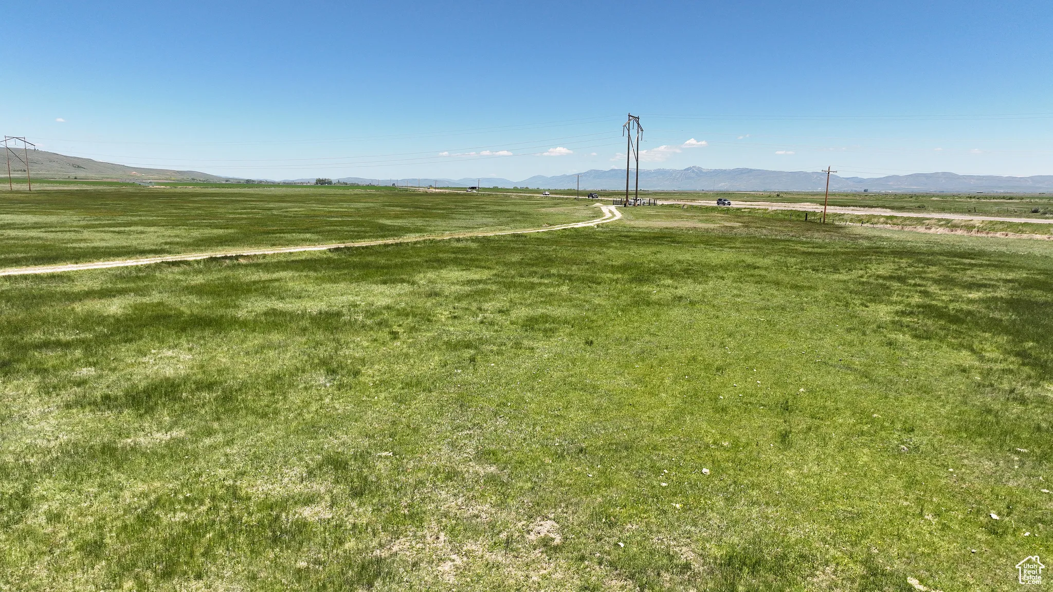 View of home's community with a rural view and a mountain view