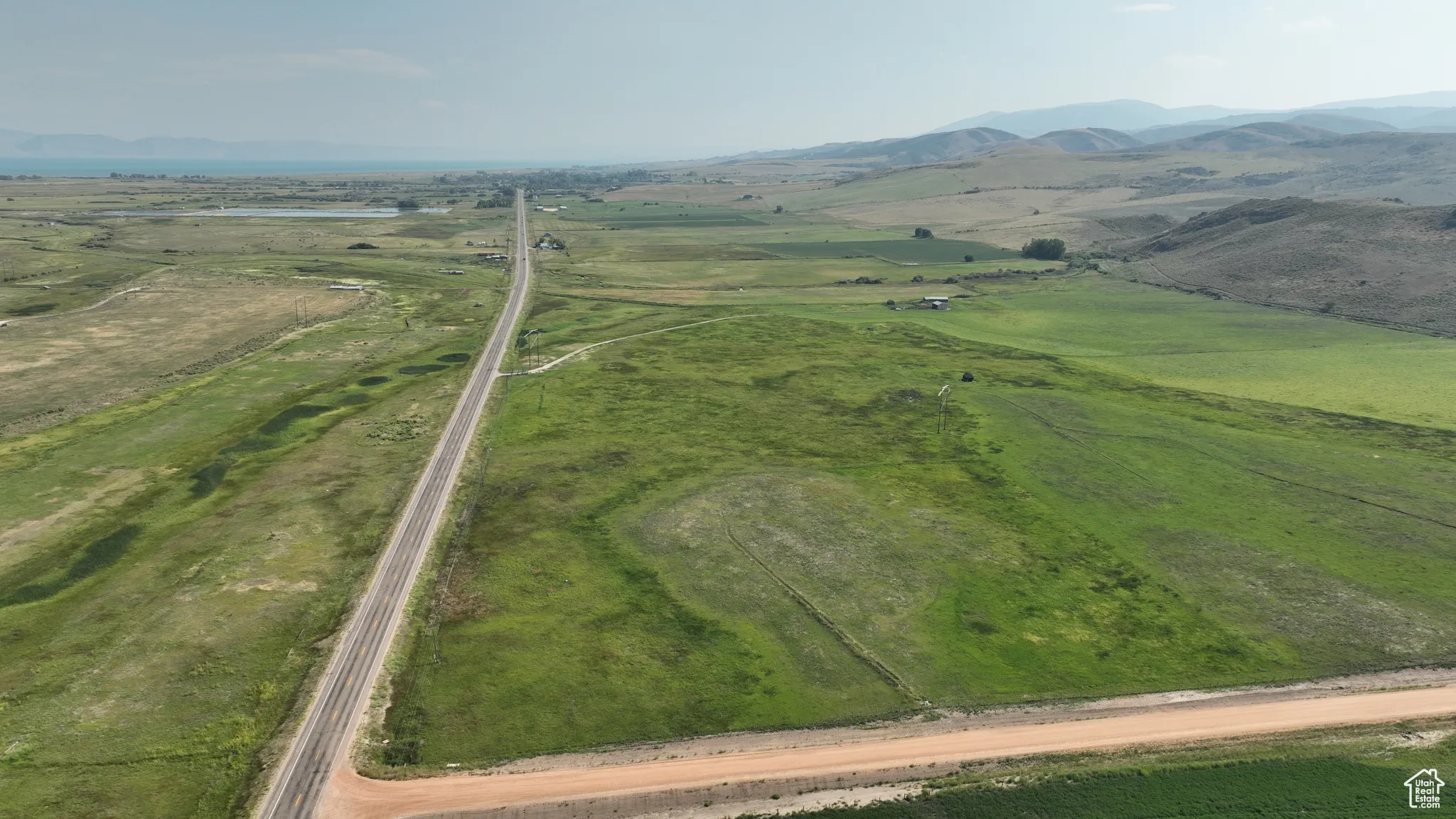View of property location with rural landscape and mountains