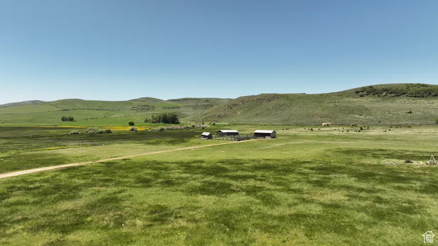 View of mountain background featuring rural landscape and agricultural land