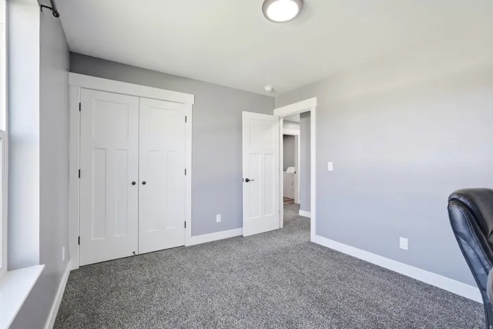 Soft gray carpeting throughout