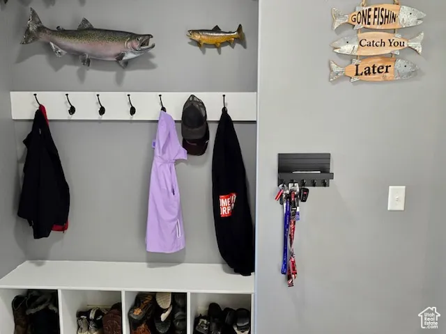Organized utility area off the garage and kitchen and walk in pantry