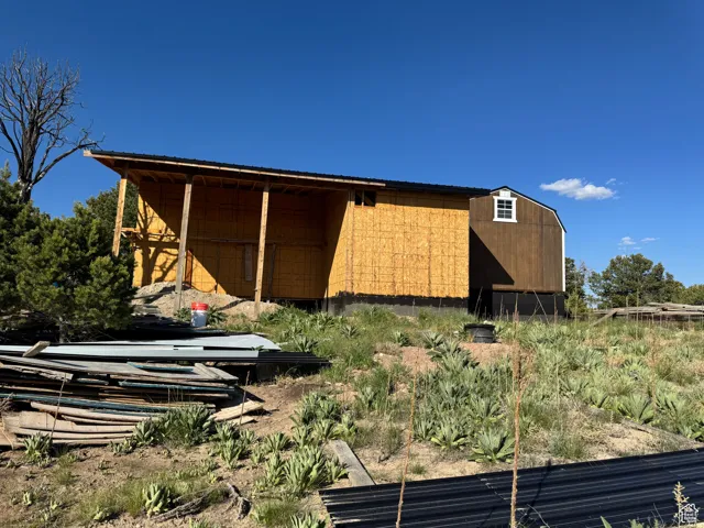 View of back of addition- can be used as carport or covered deck