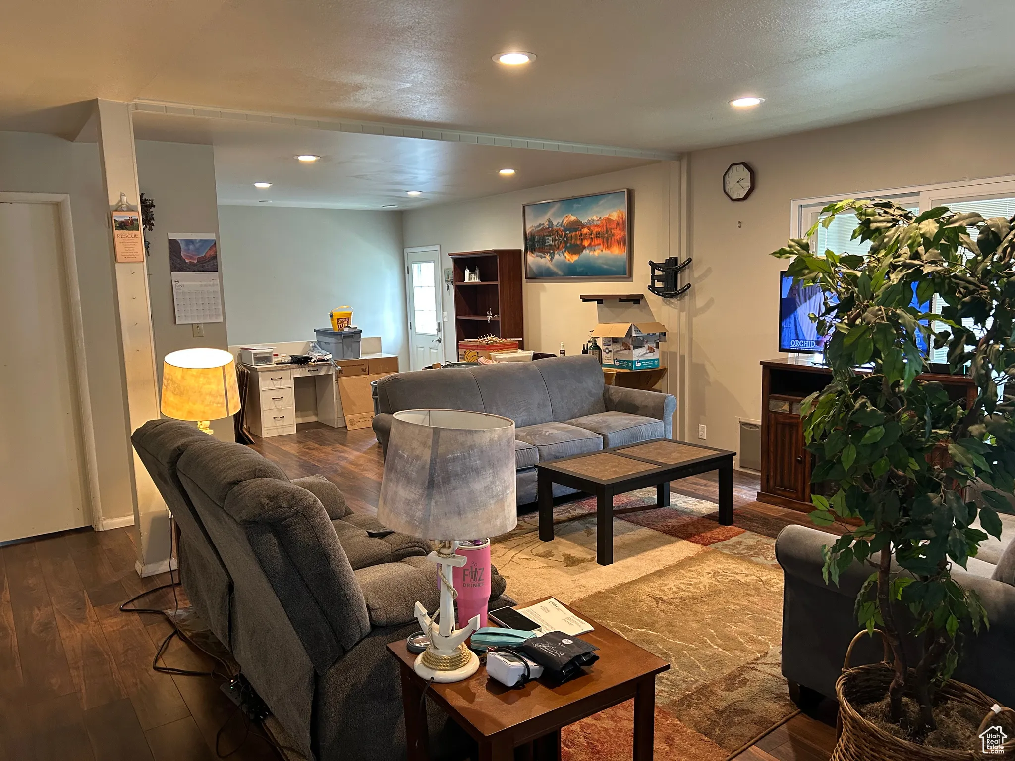 Living room featuring recessed lighting and wood finished floors