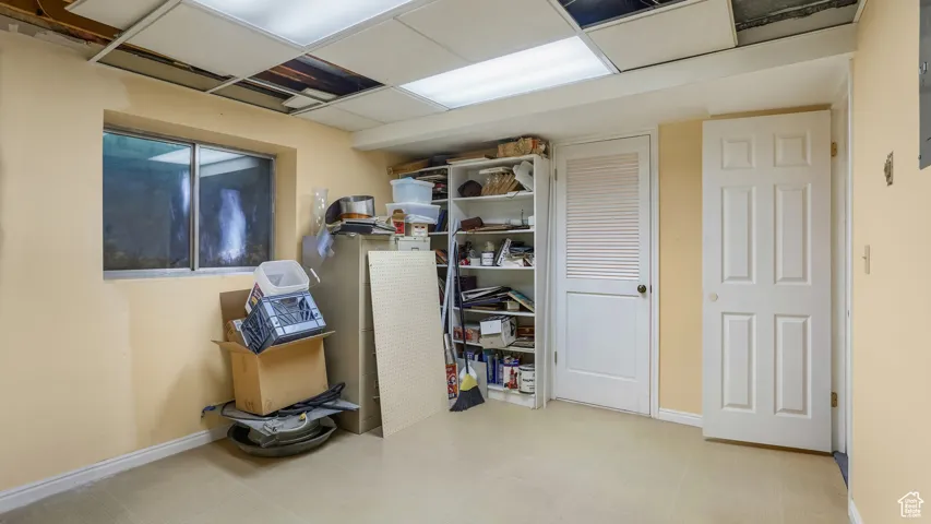 Basement featuring baseboards