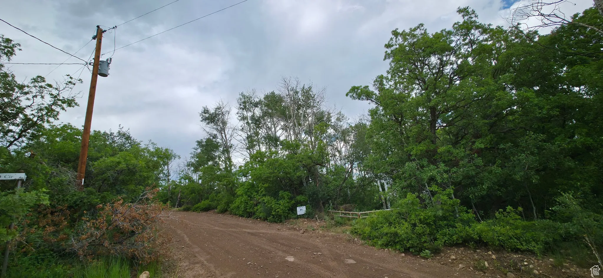 Power access pole across from gate entry to lot