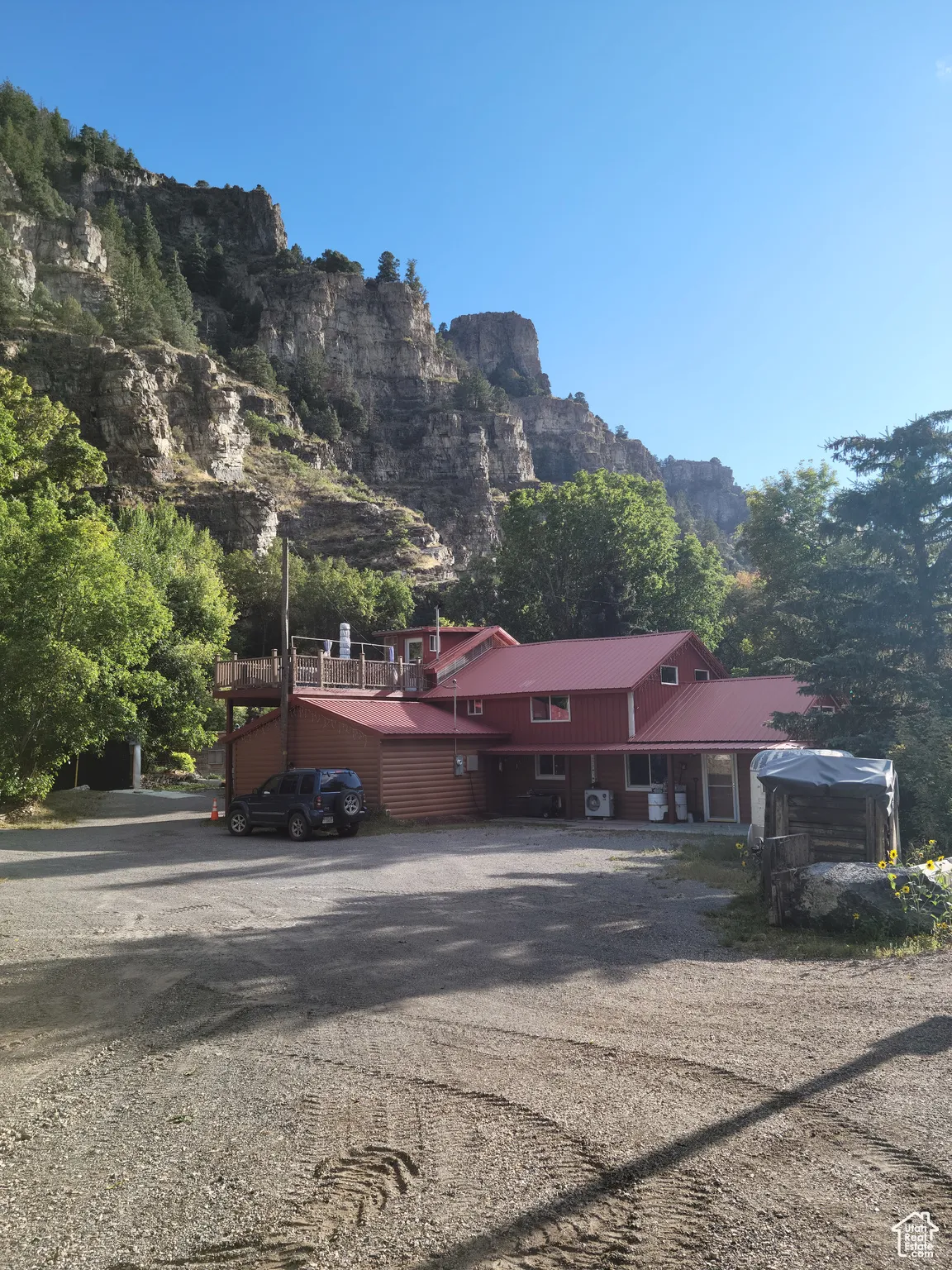 View of home with mountain background