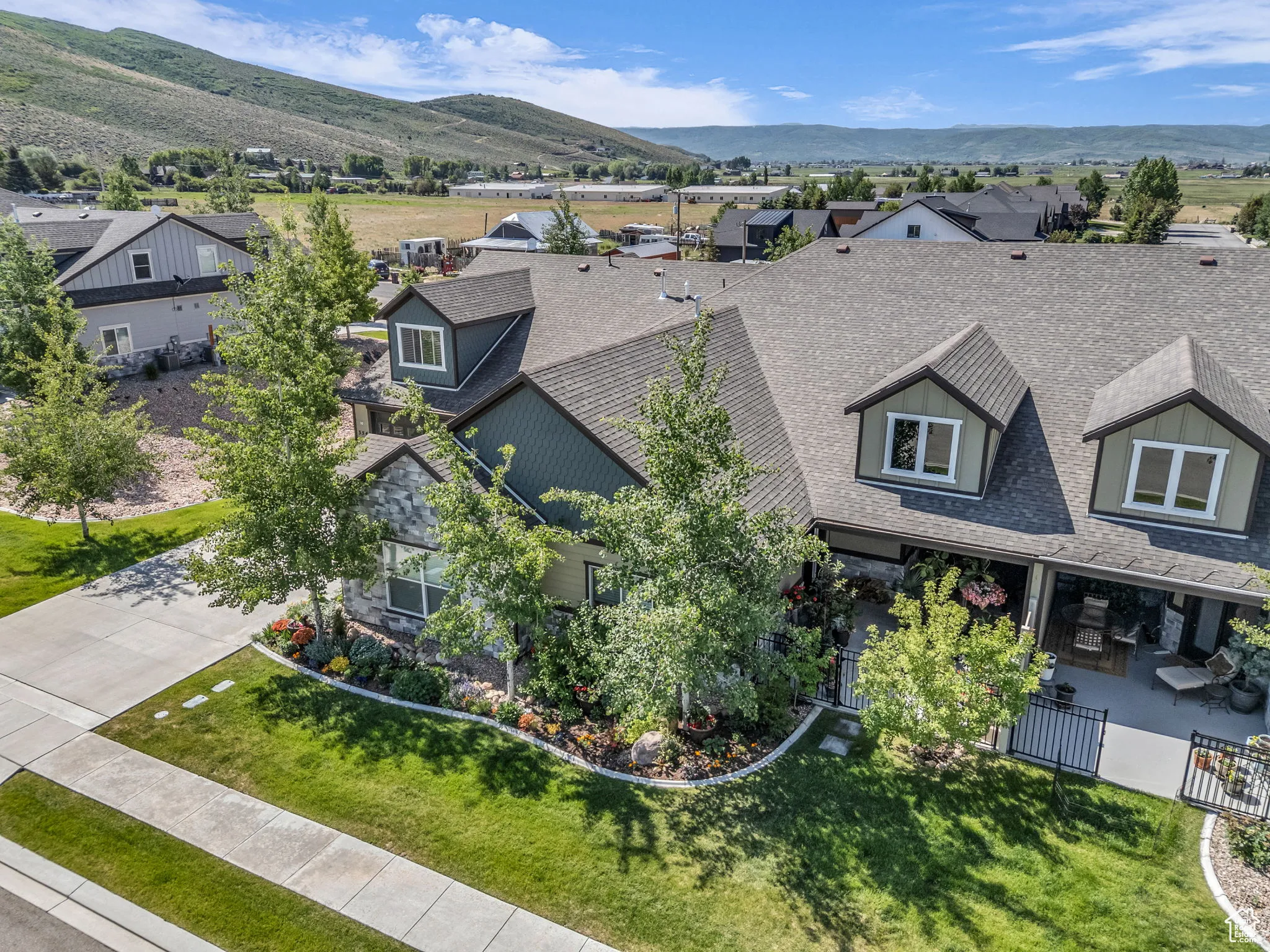 Aerial view of residential area featuring mountains