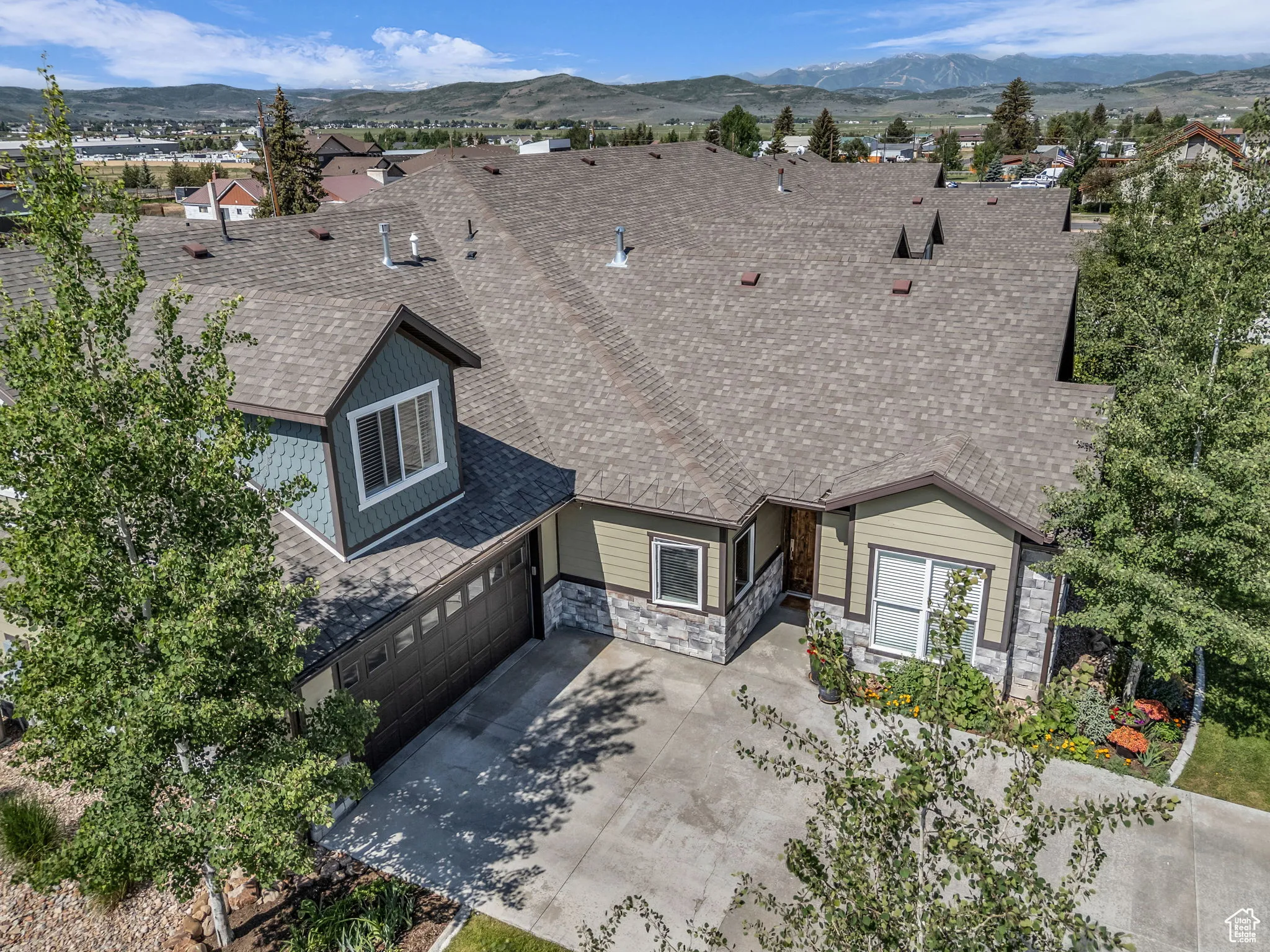 Aerial view of residential area with mountains