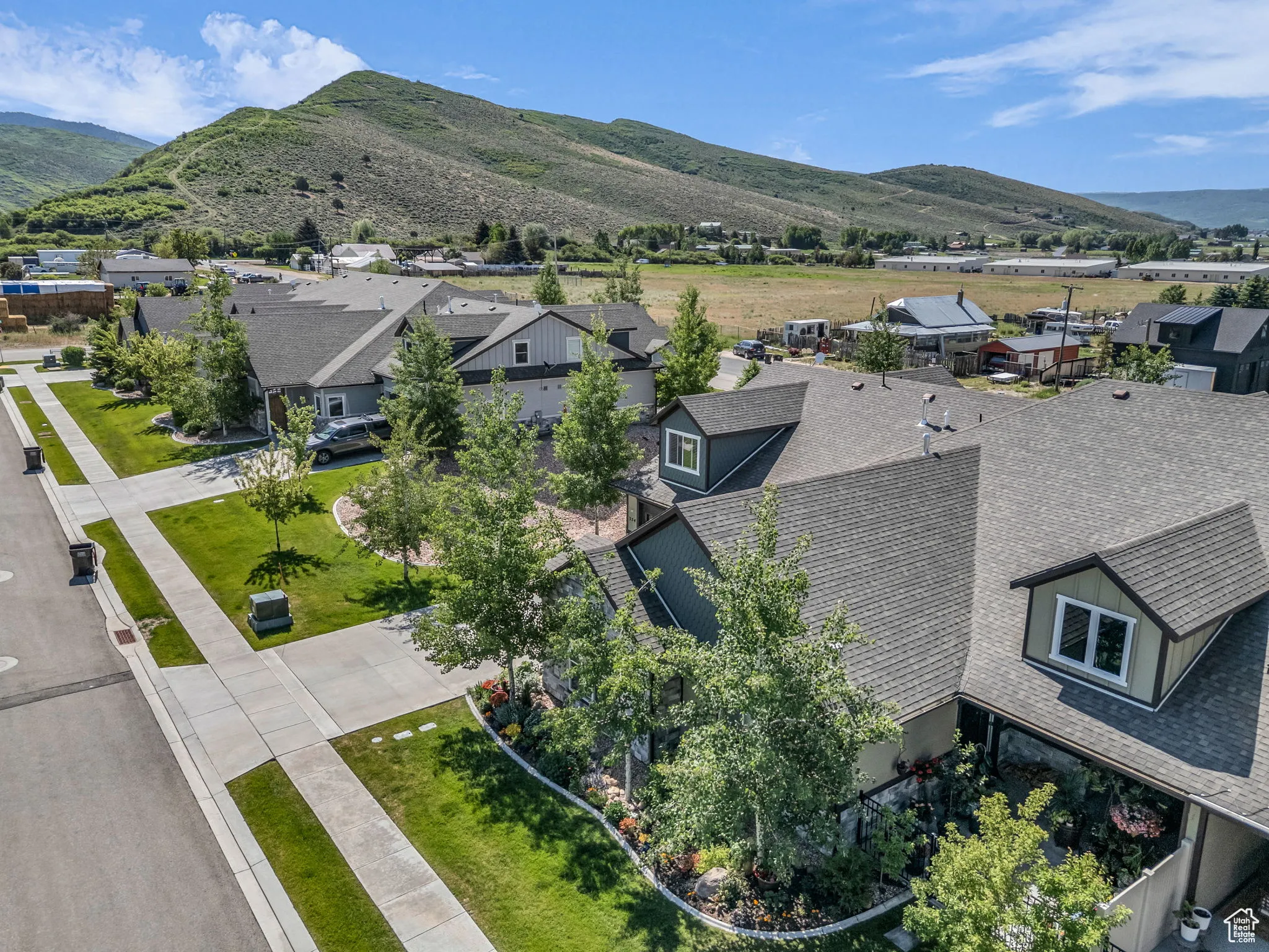 Aerial perspective of suburban area with mountains