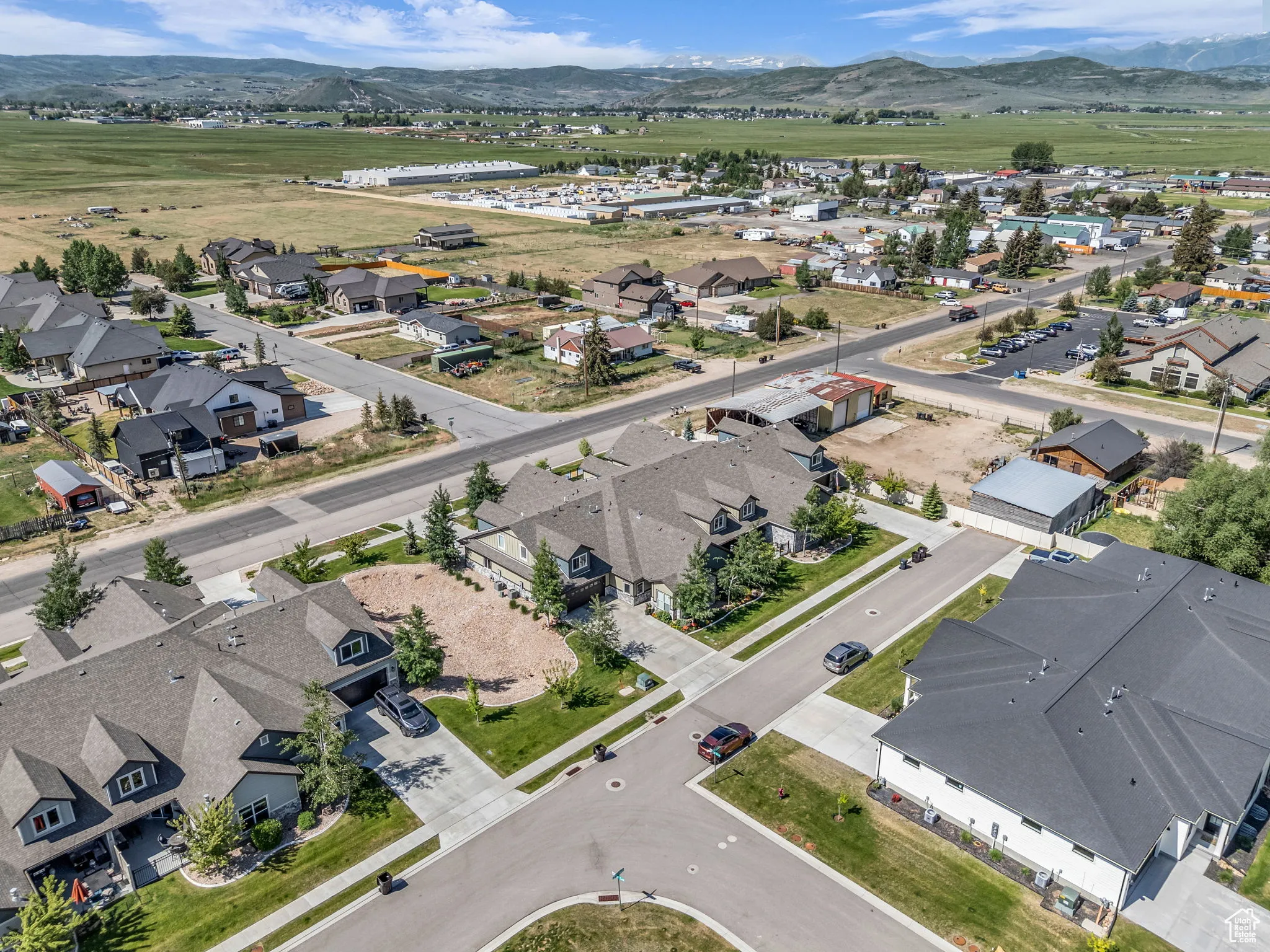 Aerial view of residential area with a mountain backdrop